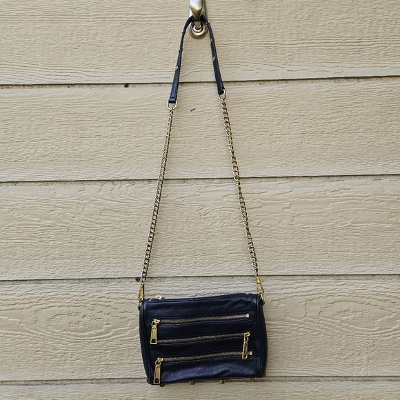 Rebecca Minkoff navy slim crossbody bag with zipper detail and studded strap - Picture 1 of 10